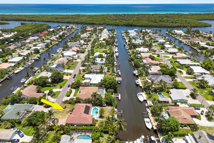 Property Photo:  8318 SE Coconut Street  FL 33455