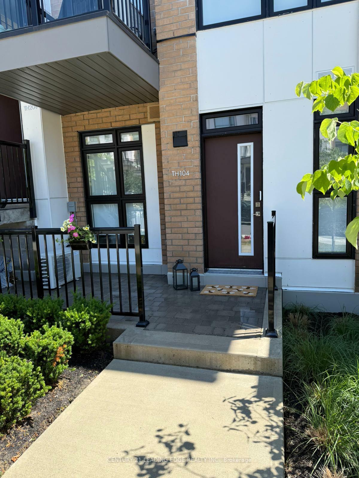 Property Photo:  145 Canon Jackson Drive Th104  ON M6M 0E1 