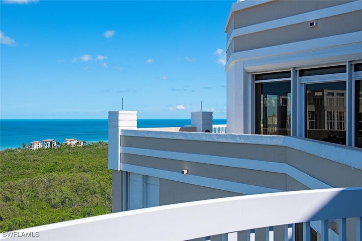 Property Photo:  7117 Pelican Bay Boulevard Penthouse 17  FL 34108 