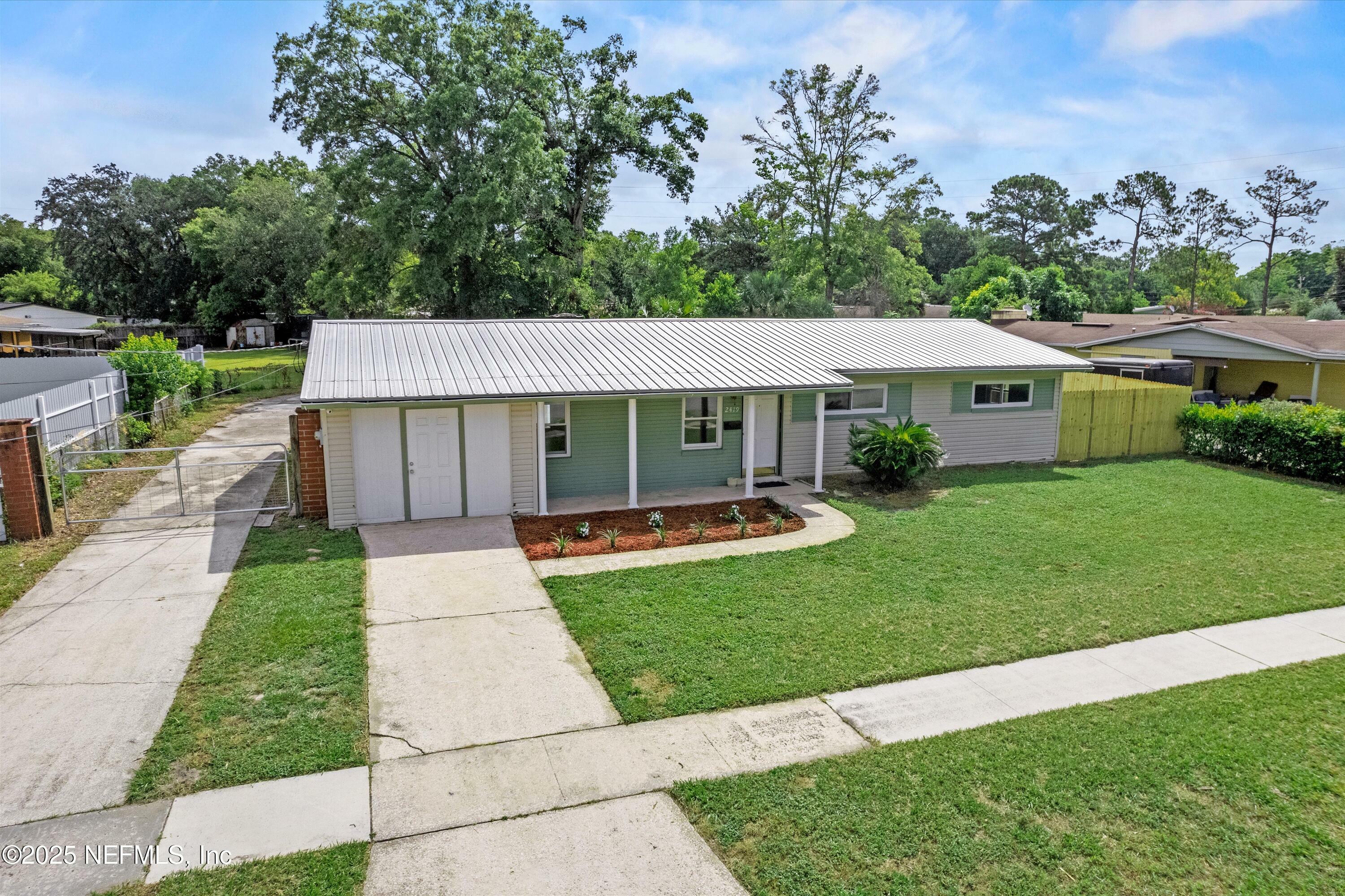 Property Photo:  2419 Burlingame Drive W  FL 32211 