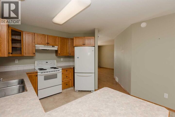 Property Photo:  173 Kingston Drive  AB T4P 3V4 