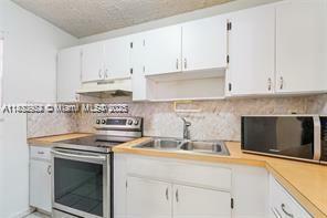 Property Photo: 6055 W 19th Ave 314 FL 33012