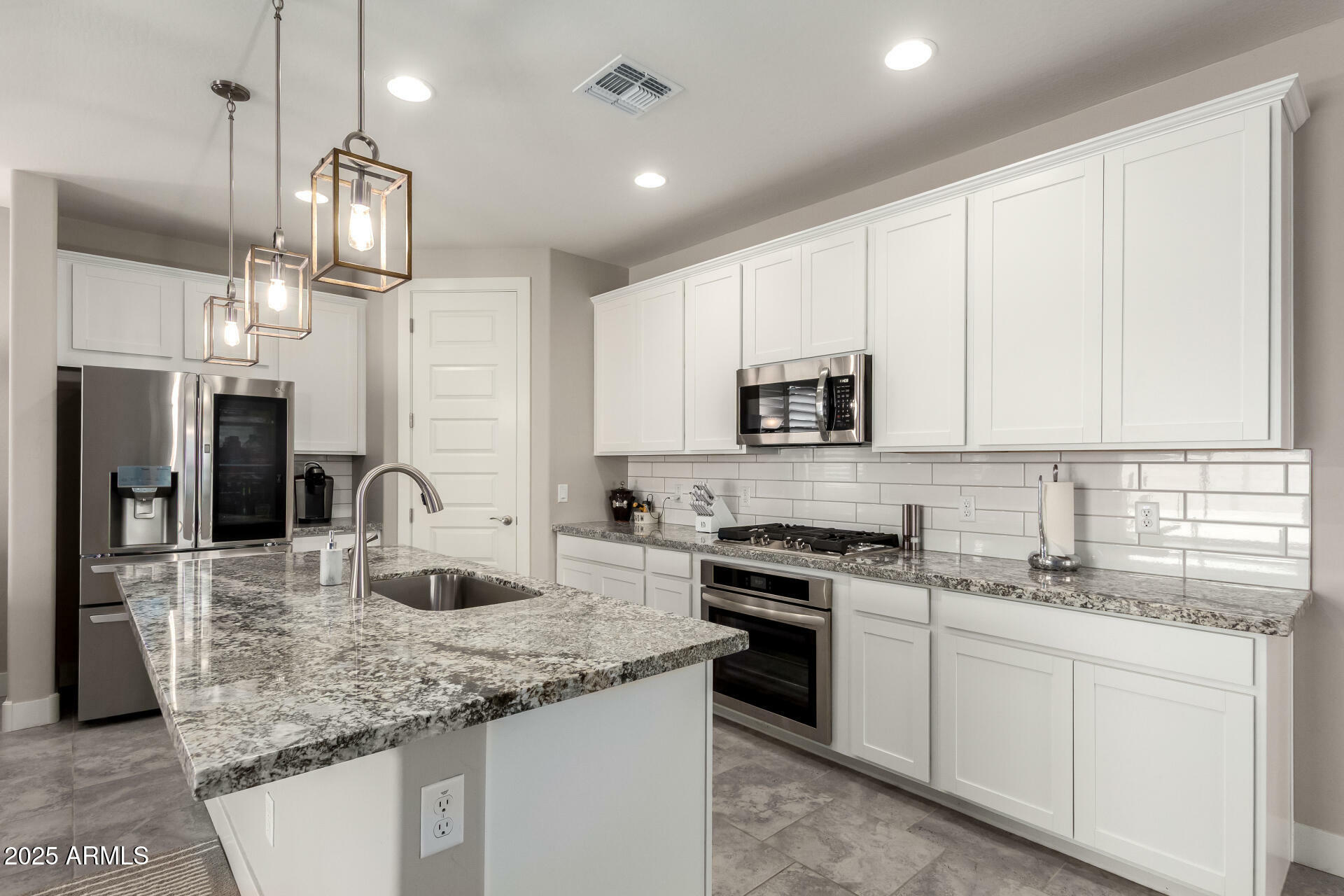 Property Photo: 19472 W Badgett Lane AZ 85340