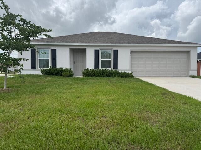 Property Photo: 591 SW Halifax Avenue FL 34953