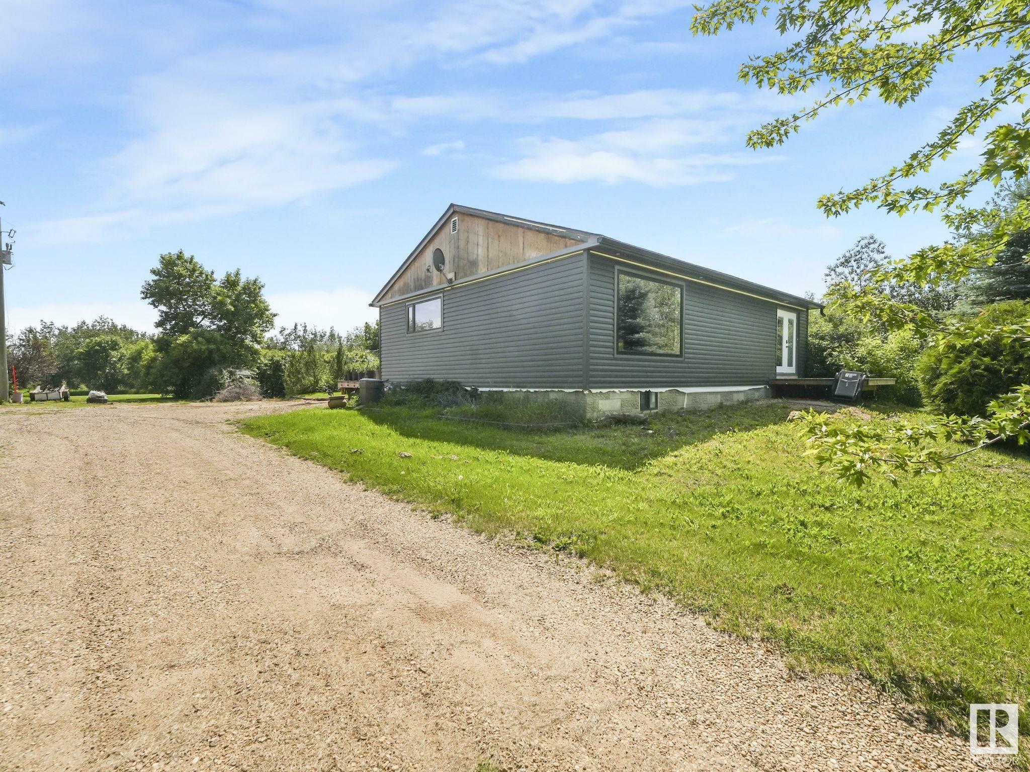 Property Photo: 26307 Twp Road 570 AB T8R 2K7