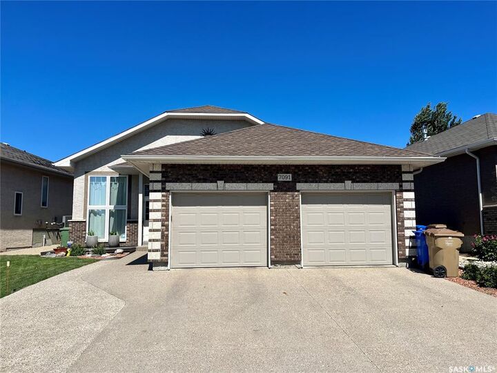 Property Photo:  7091 Maple Ridge Drive  SK S4X 0B2 
