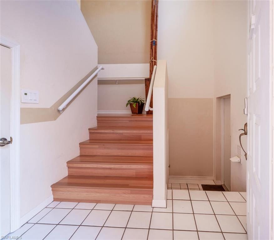Property Photo: 15260 Cedarwood Ln A-201 FL 34110
