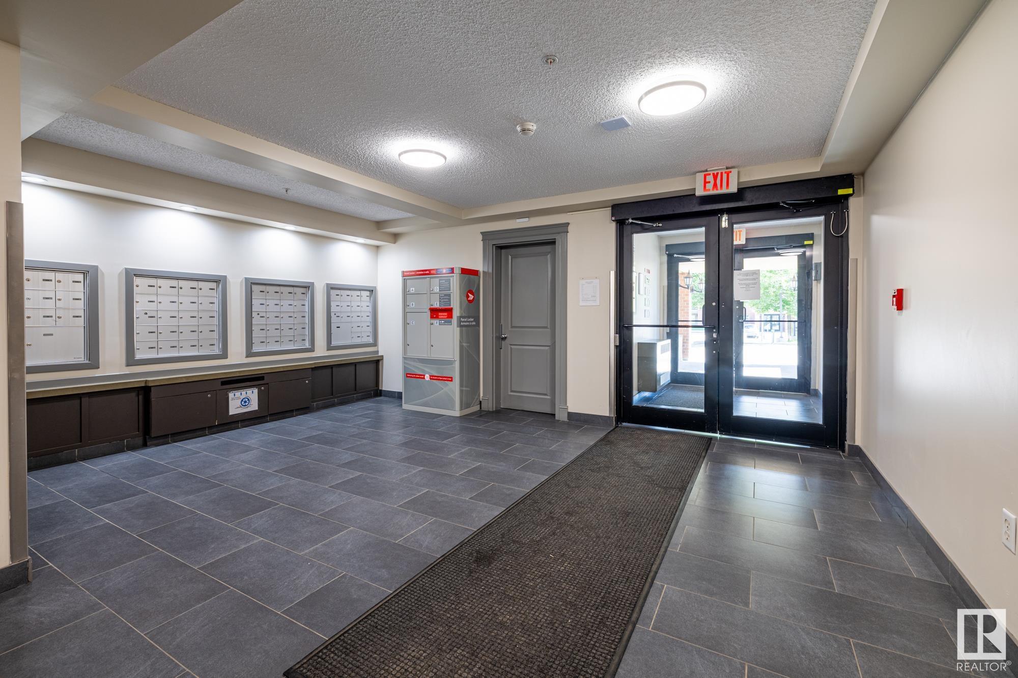 Property Photo: 11449 Ellerslie Road SW 412 AB T6W 1T2