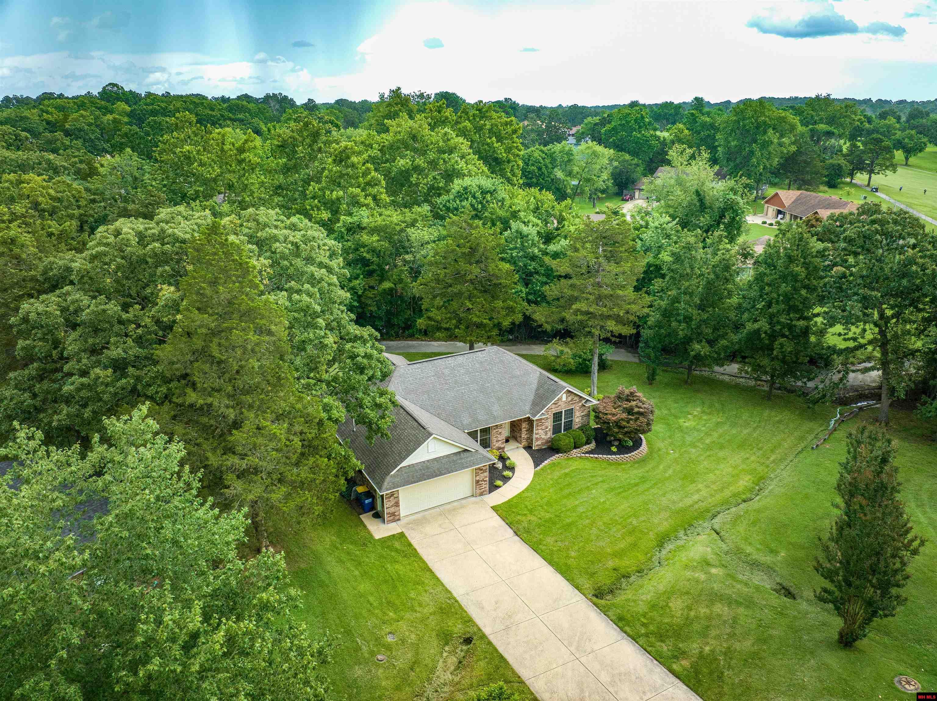 Property Photo:  709 Tee Drive  AR 72653 