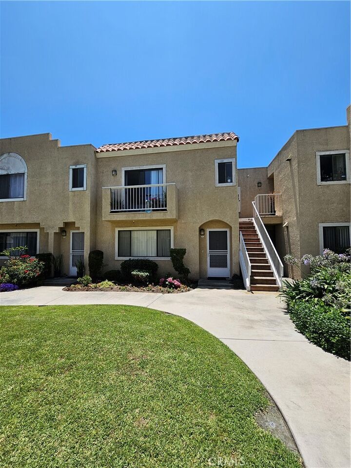 Property Photo:  13171 Newland Street 11  CA 92844 