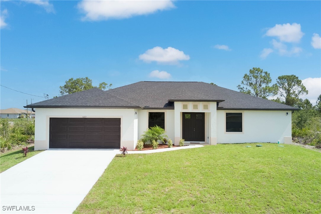 637 Cardinal Street E  Lehigh Acres FL 33974 photo