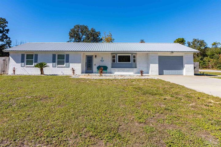 Property Photo:  1969 Frontera St  FL 32566 