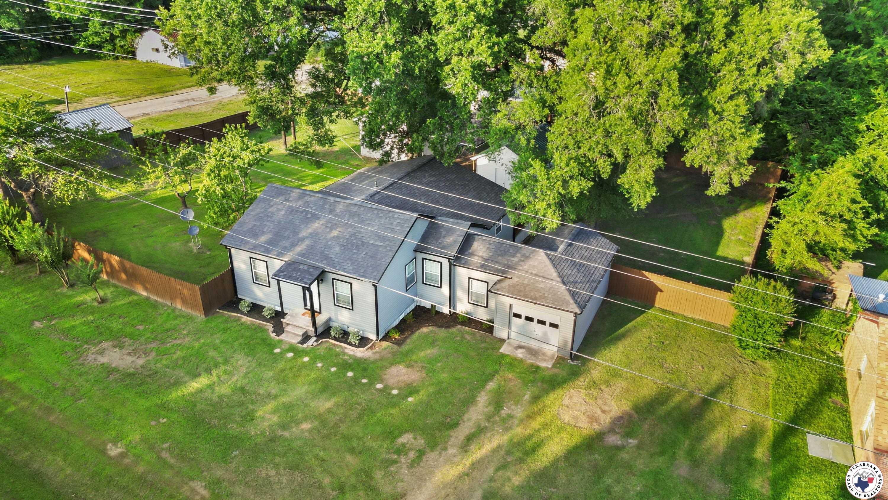 Property Photo:  405 Red River Road S  TX 75573 