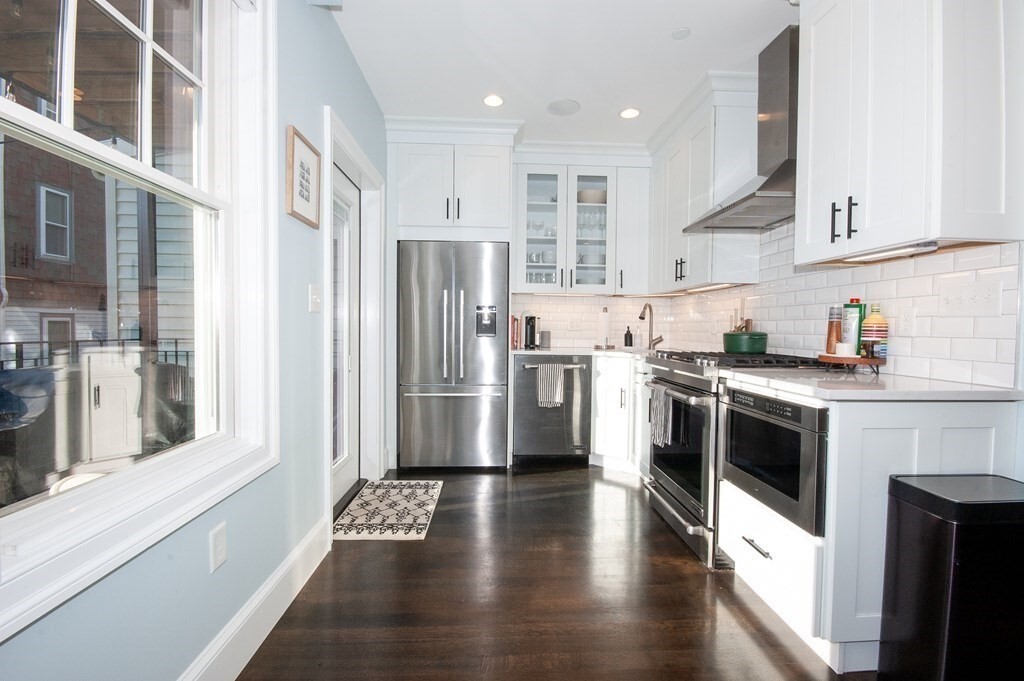 Property Photo: 213 W 5th 1 MA 02127
