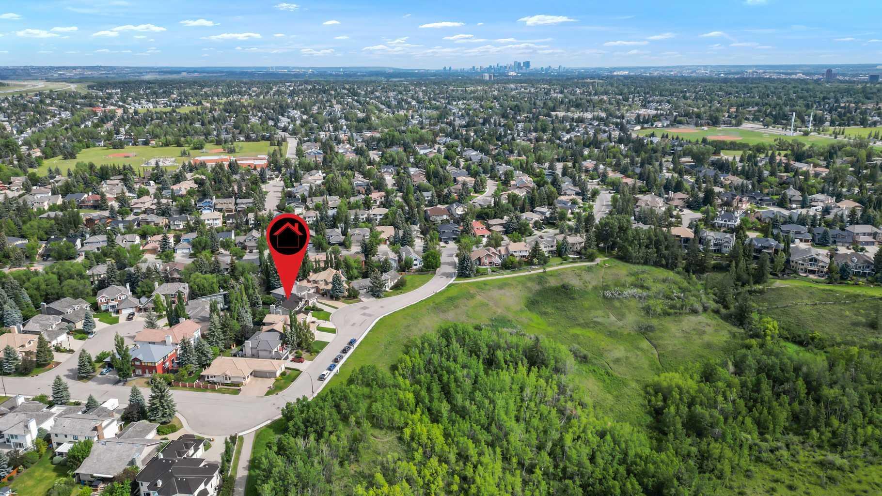 Photo de la propriété: 163 Woodhaven Crescent SW AB T2W 5R3