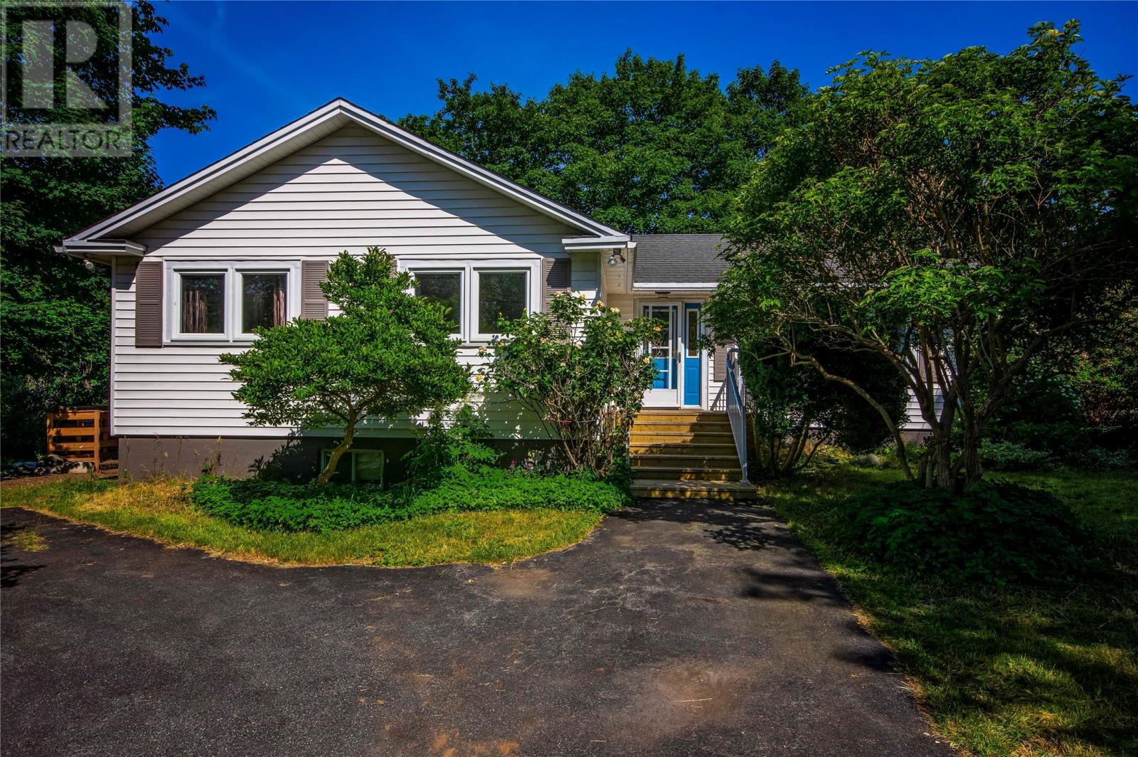 Property Photo: 6 Topsail Beach Road NL A1W 5V9
