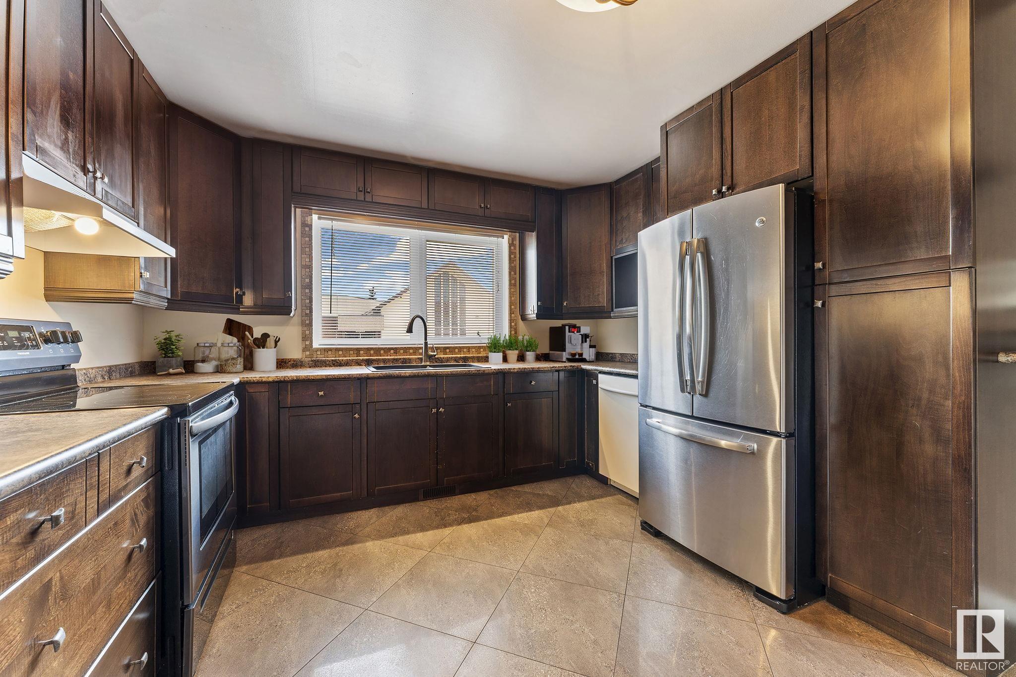 Property Photo: 13220 95 Street NW AB T5E 3Y4