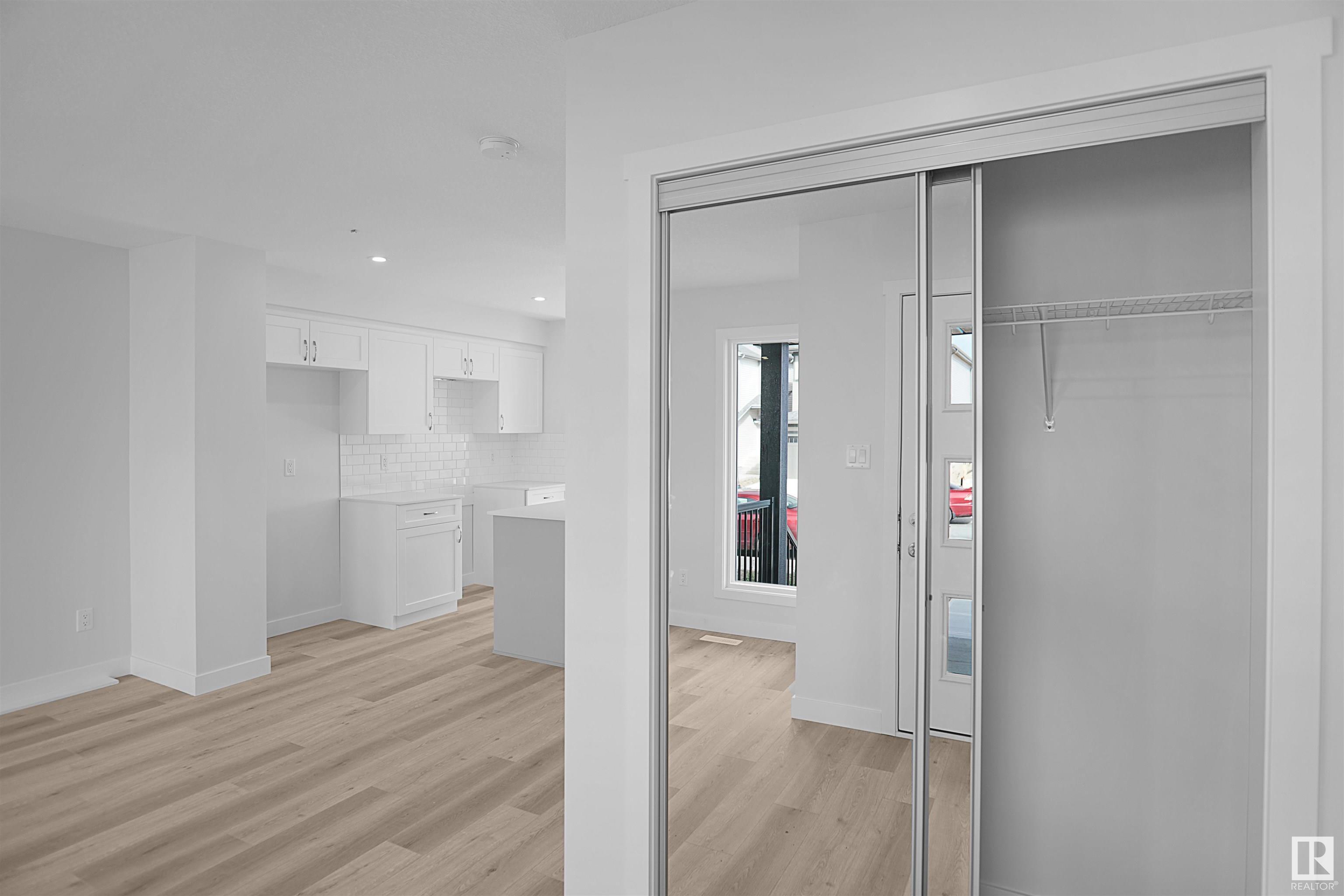 Property Photo:  21035 25 Avenue NW  AB T5Y 4G2 