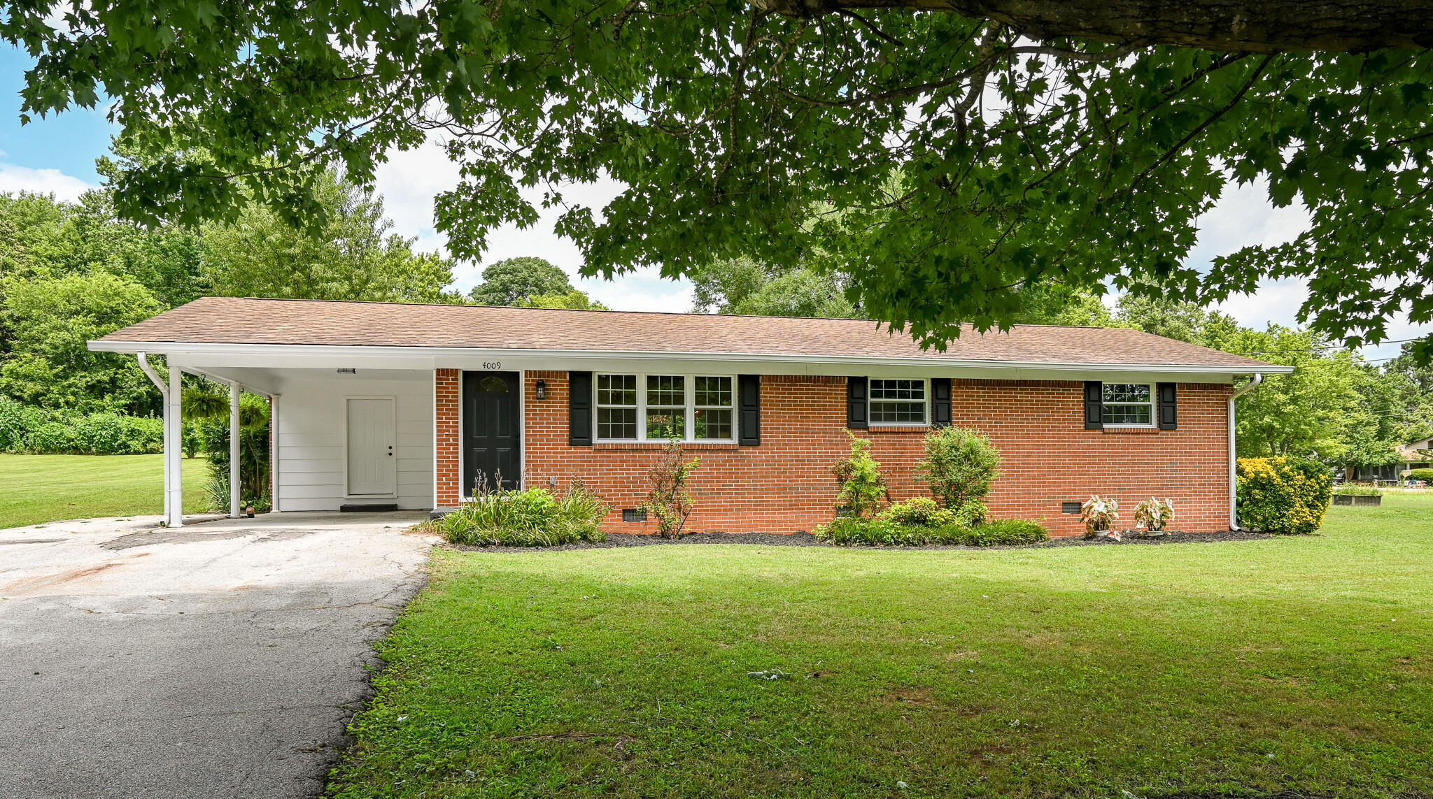 Property Photo: 4009 Sycamore Drive NW TN 37312