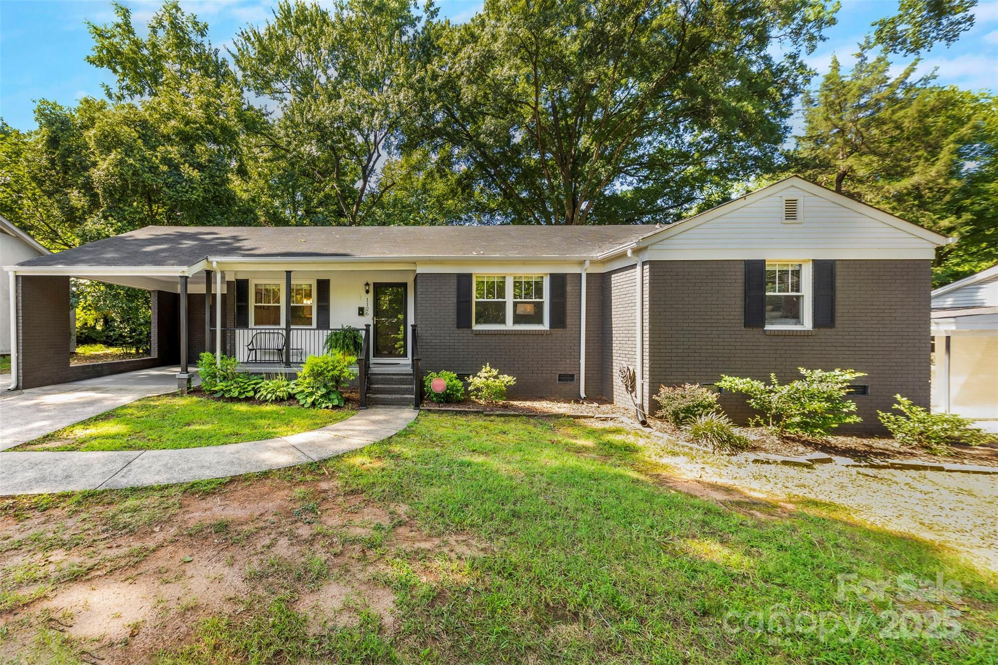 Property Photo: 1126 E Woodlawn Road NC 28209