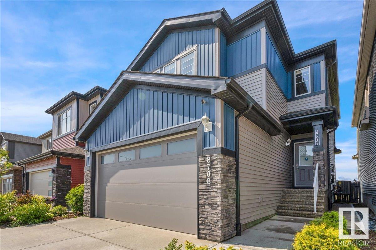 Property Photo:  8708 223 Street NW  AB T5T 7L6 