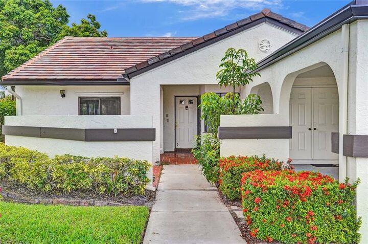 Property Photo:  5658 Parkwalk Circle East  FL 33472 