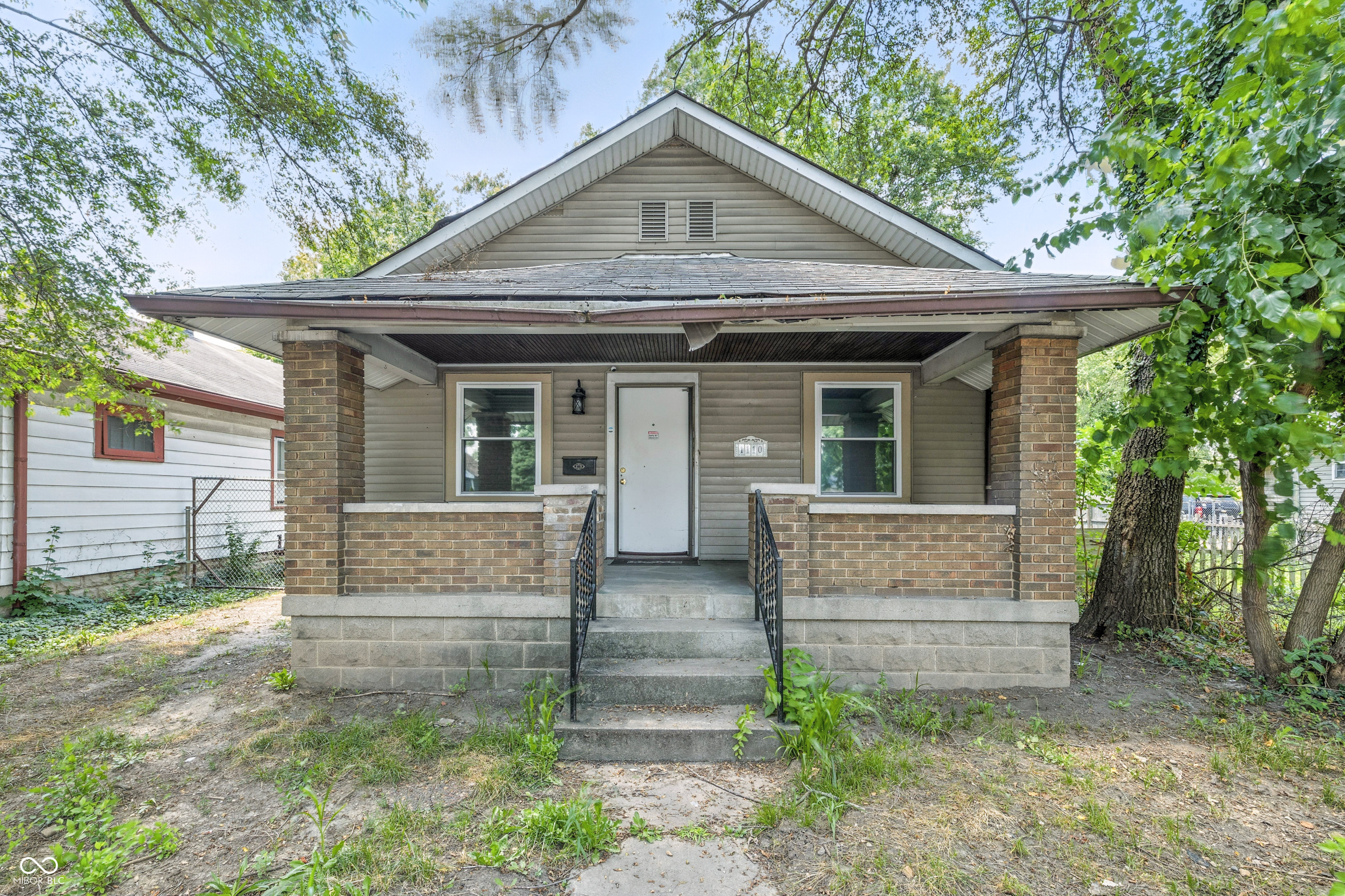 Property Photo: 1110 N Tibbs Avenue IN 46222