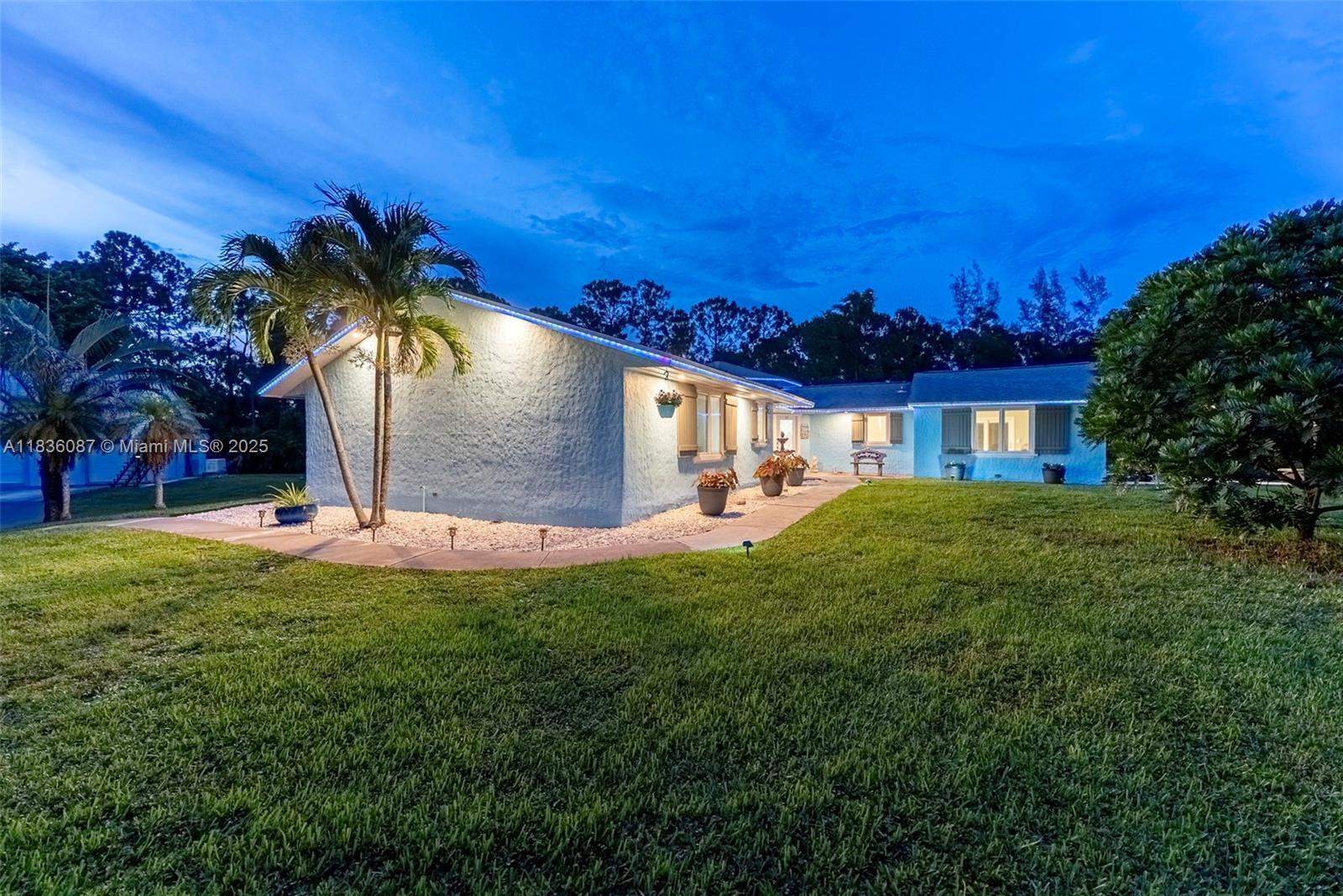 Property Photo: 10709 N 159th Ct N FL 33478