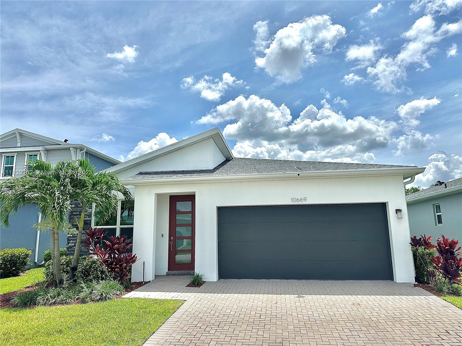 Property Photo: 10669 SW Gloriana St FL 34987