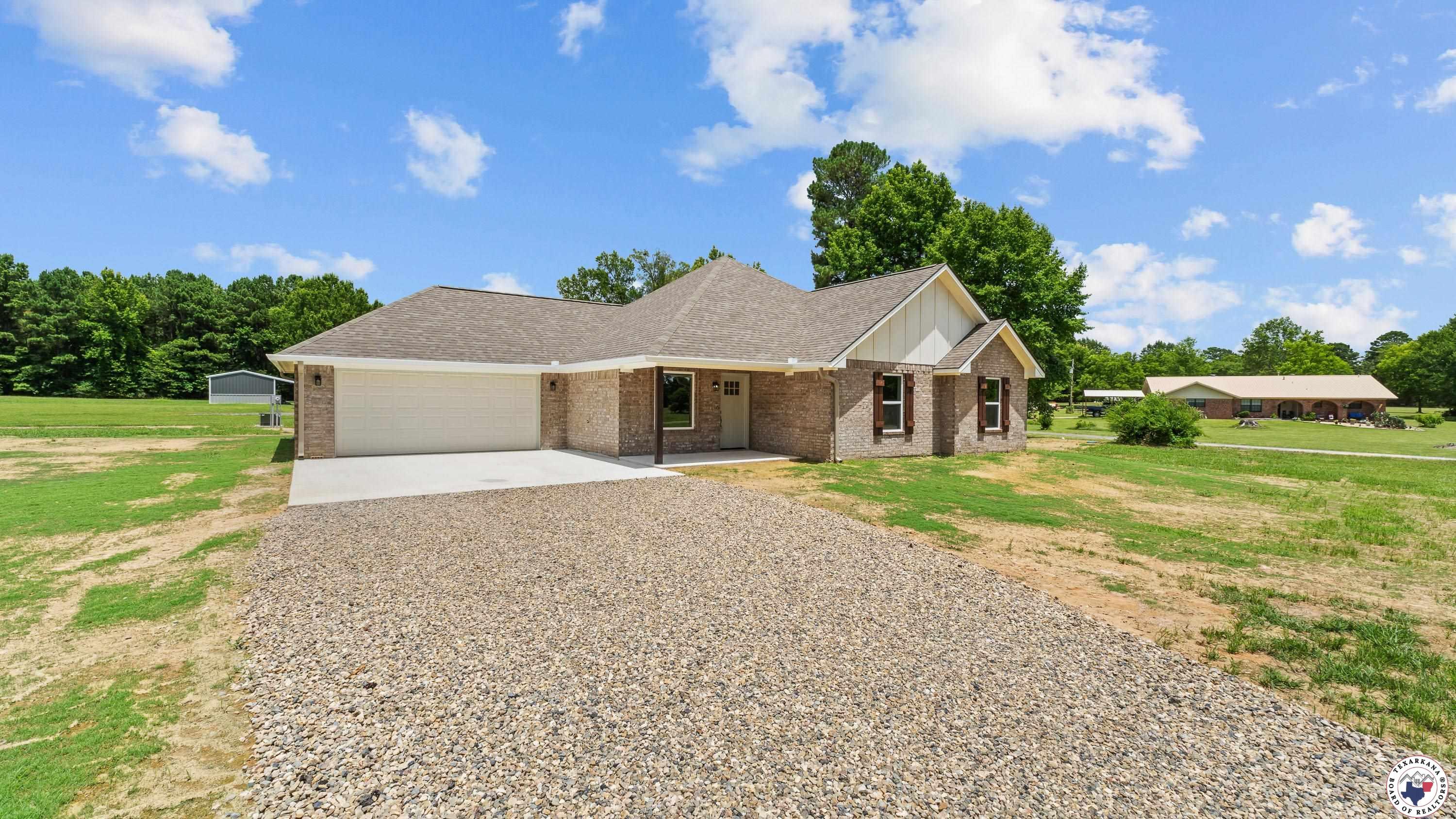 Property Photo: 206 Spencer St TX 75567