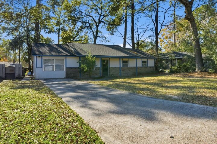 Property Photo:  307 Jill Street  TX 77303 