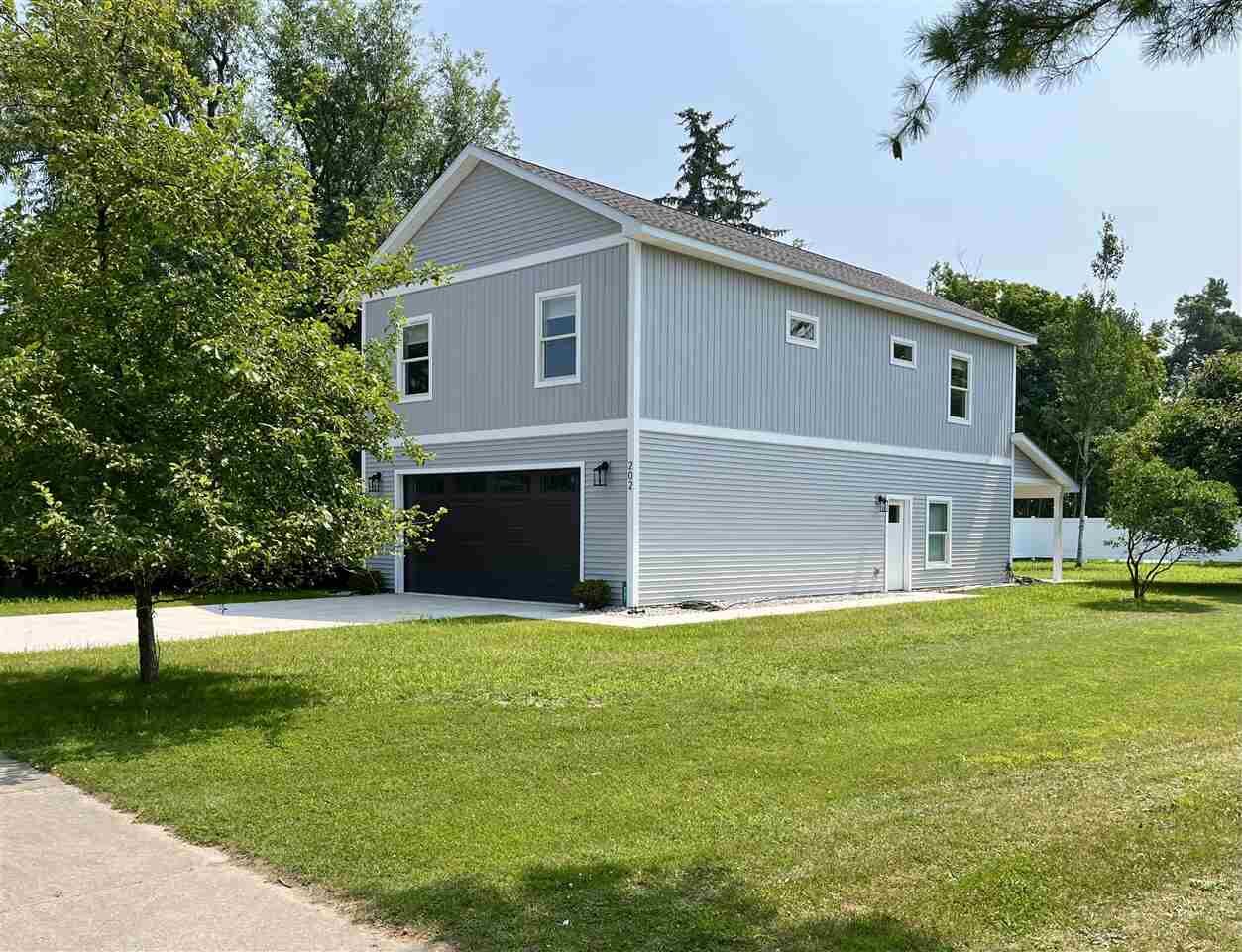 Property Photo:  202 W Carpenter  MI 49720 