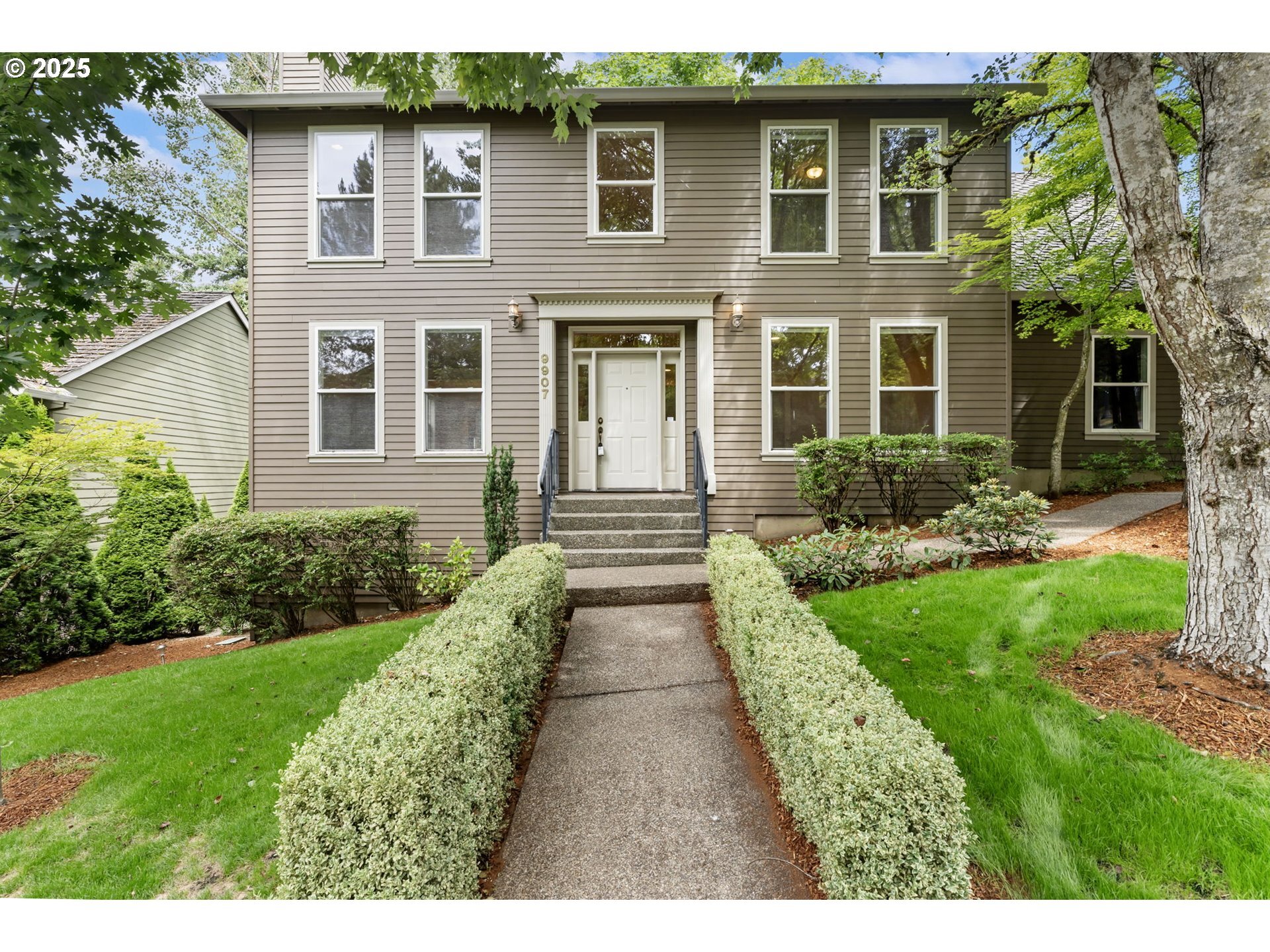 Property Photo:  9907 NW Bartholomew Dr  OR 97229 