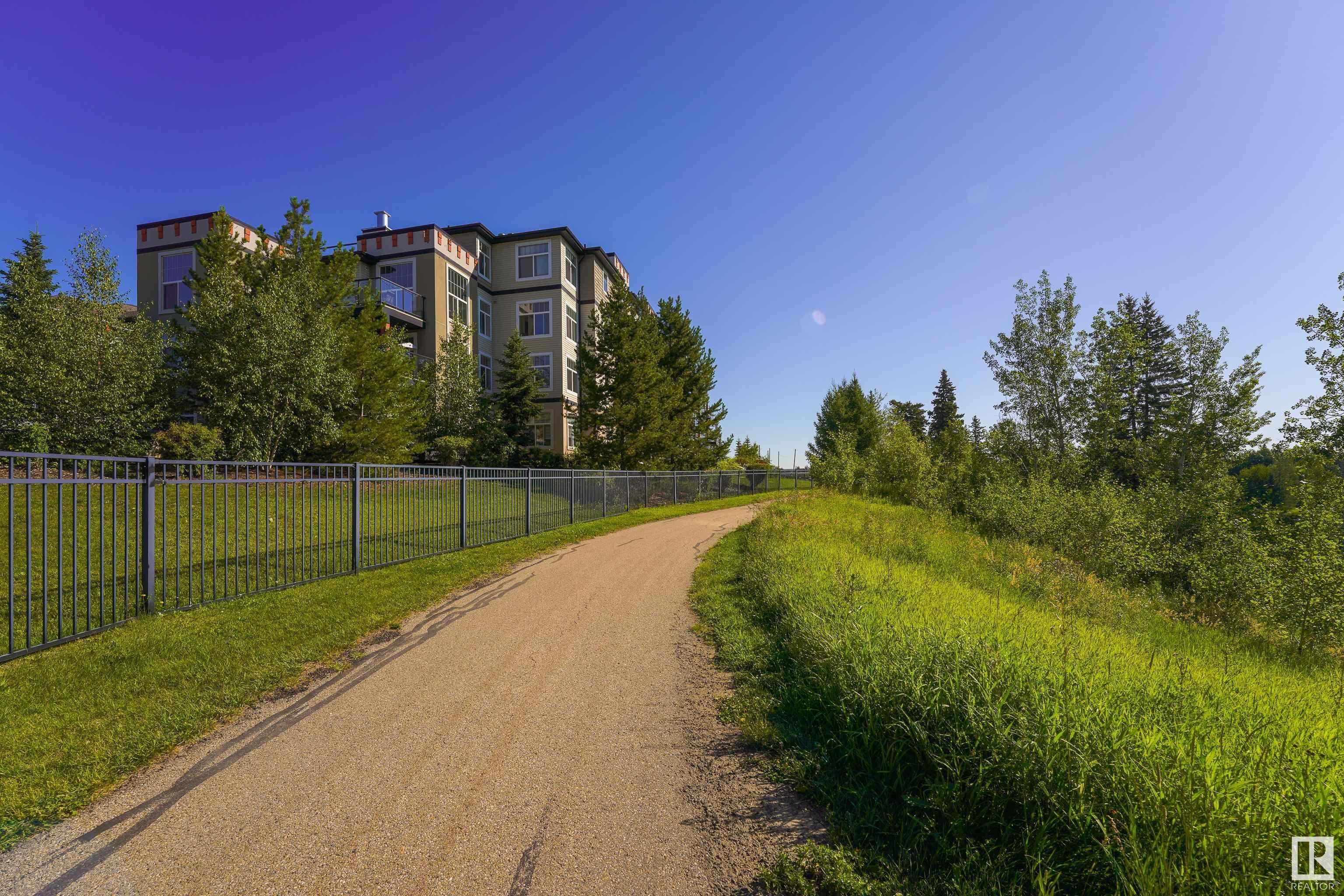 Property Photo: 1623 James Mowatt Trail SW 209 AB T6W 0J7