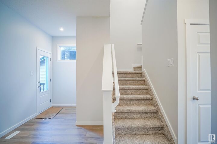 Property Photo: 113 Ficus Way AB T8L 0Z6