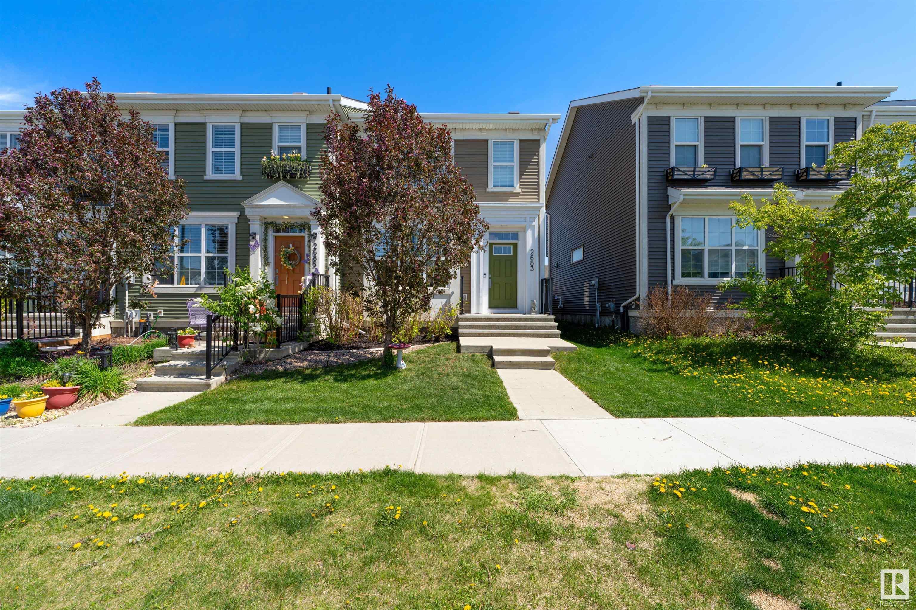 Property Photo: 2683 Maple Way NW AB T6T 2C8