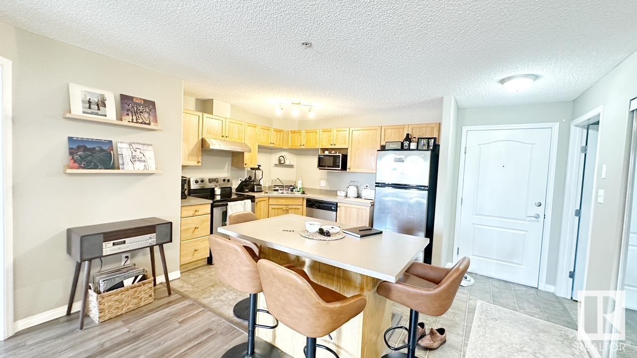Property Photo:  9363 Simpson Drive NW 1112  AB T6R 0N2 