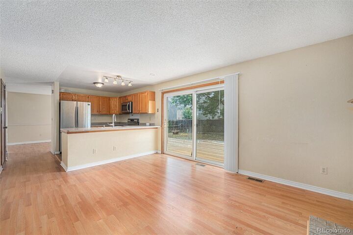 Property Photo: 17984 E Bates Avenue CO 80013
