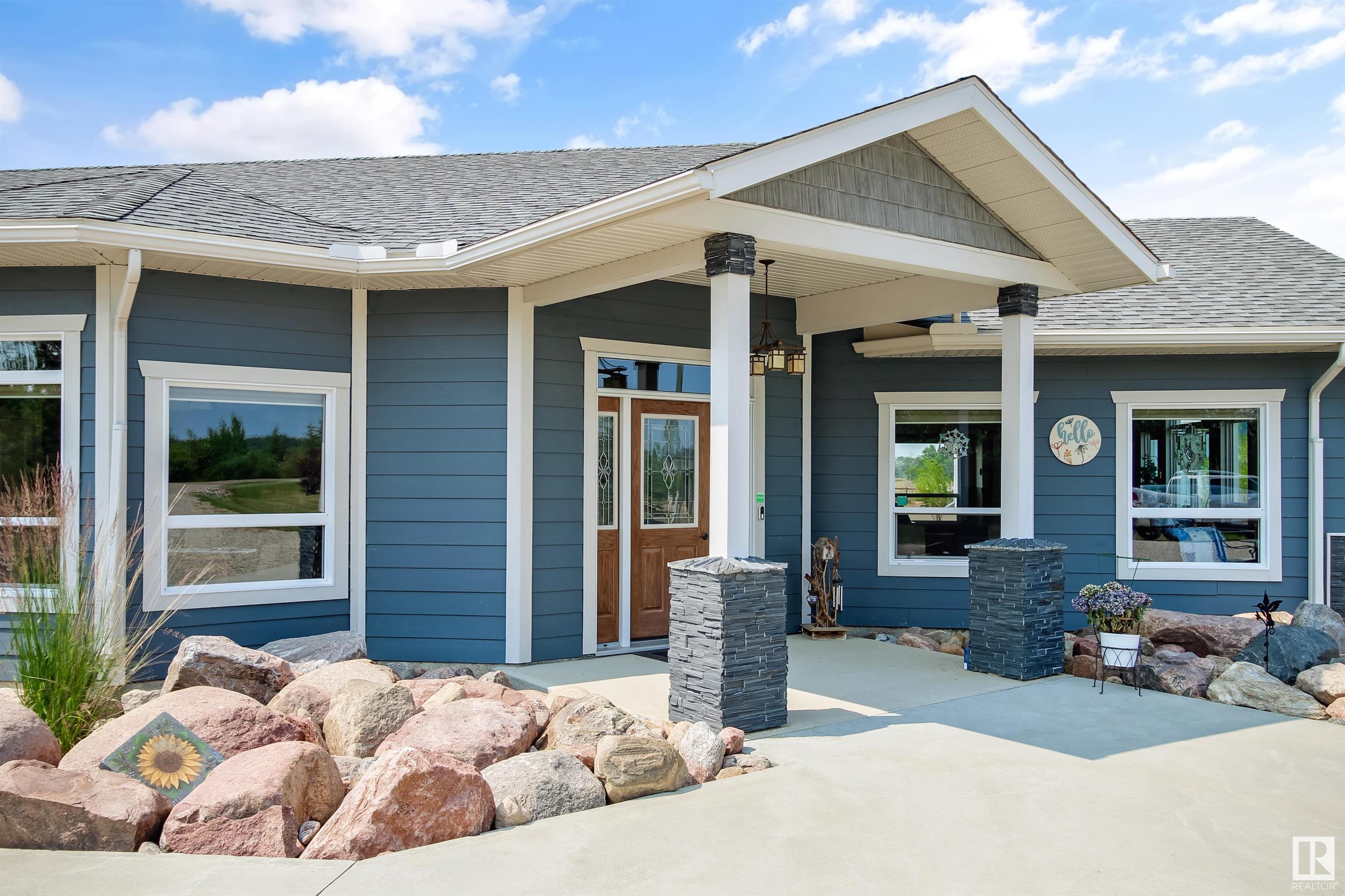 Property Photo: 63006A Rdg Rd 414 AB T9M 1P1