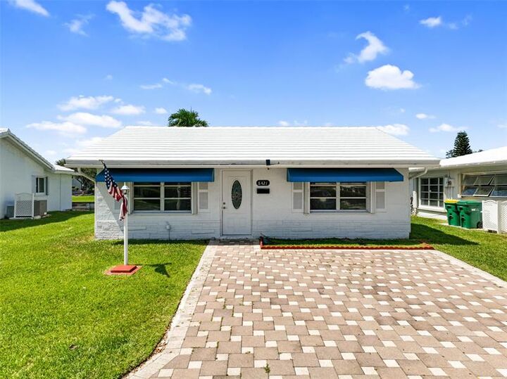 Property Photo: 8421 NW 59th Pl FL 33321