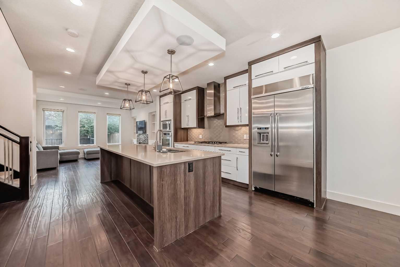 Property Photo: 236 25 Avenue NW AB T2M 2A5