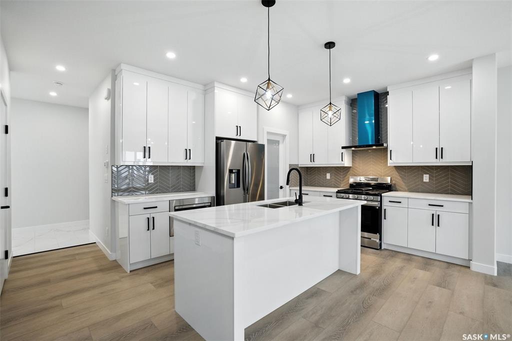 Property Photo:  218 Sharma Lane  SK S7W 0Y4 