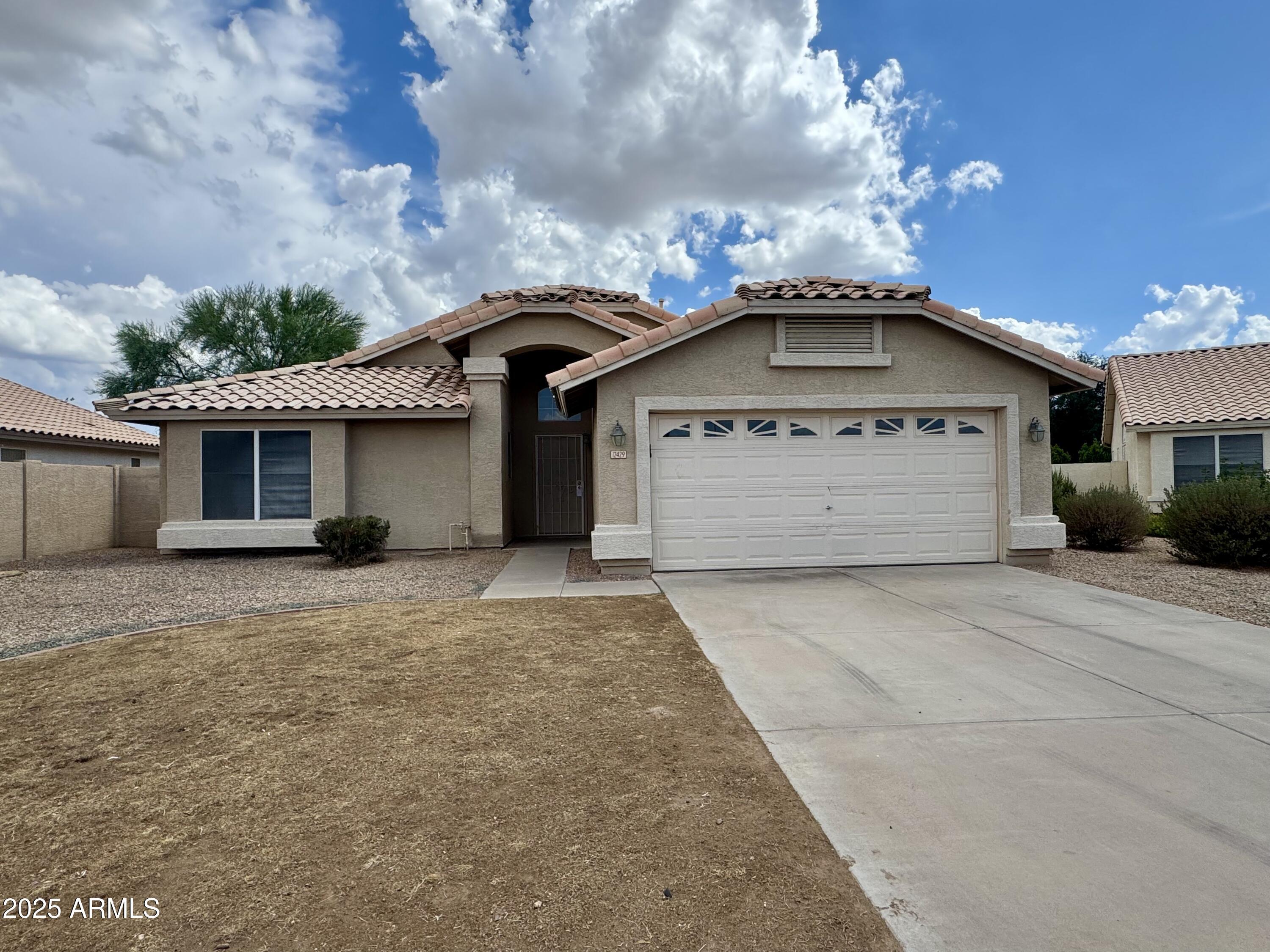 Property Photo: 12429 W Roanoke Avenue AZ 85392