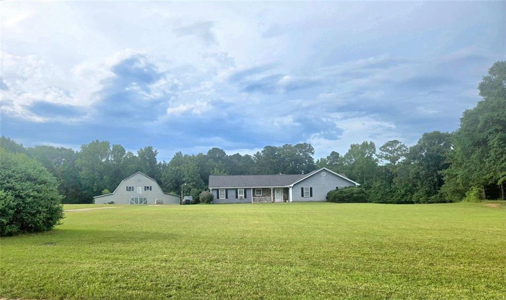 Property Photo:  55 Rolling Road  GA 30025 