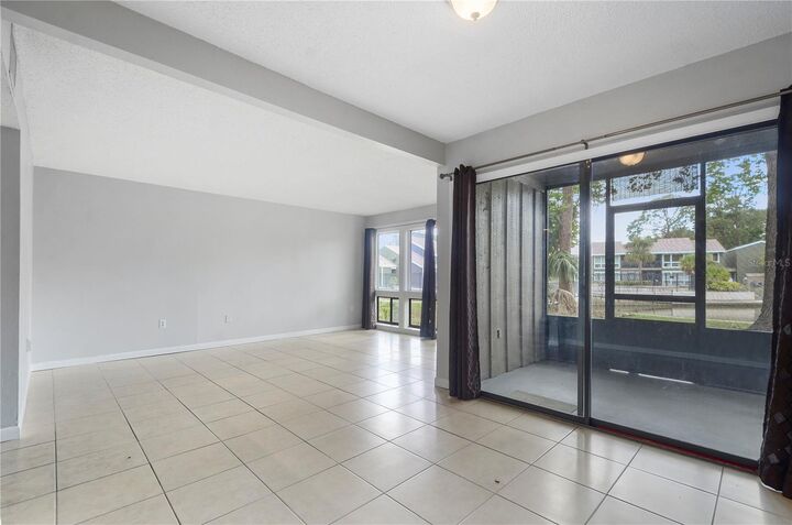 Property Photo:  5957 Windhover Drive C03  FL 32819 