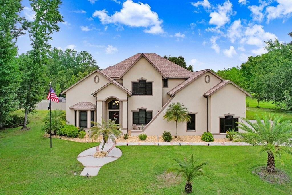 Property Photo:  8935 Woodleaf Boulevard  FL 33544 