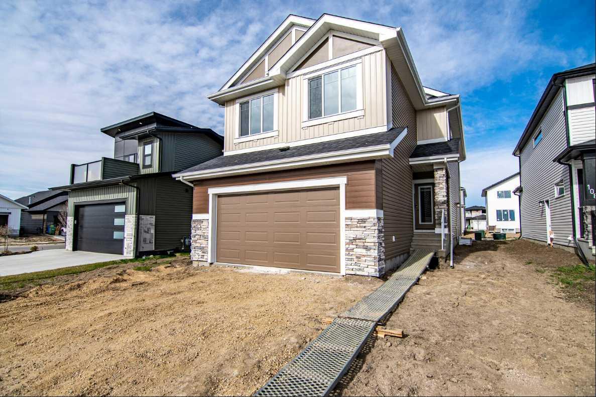 Property Photo:  104 Emerald Drive  AB T4P 3G8 