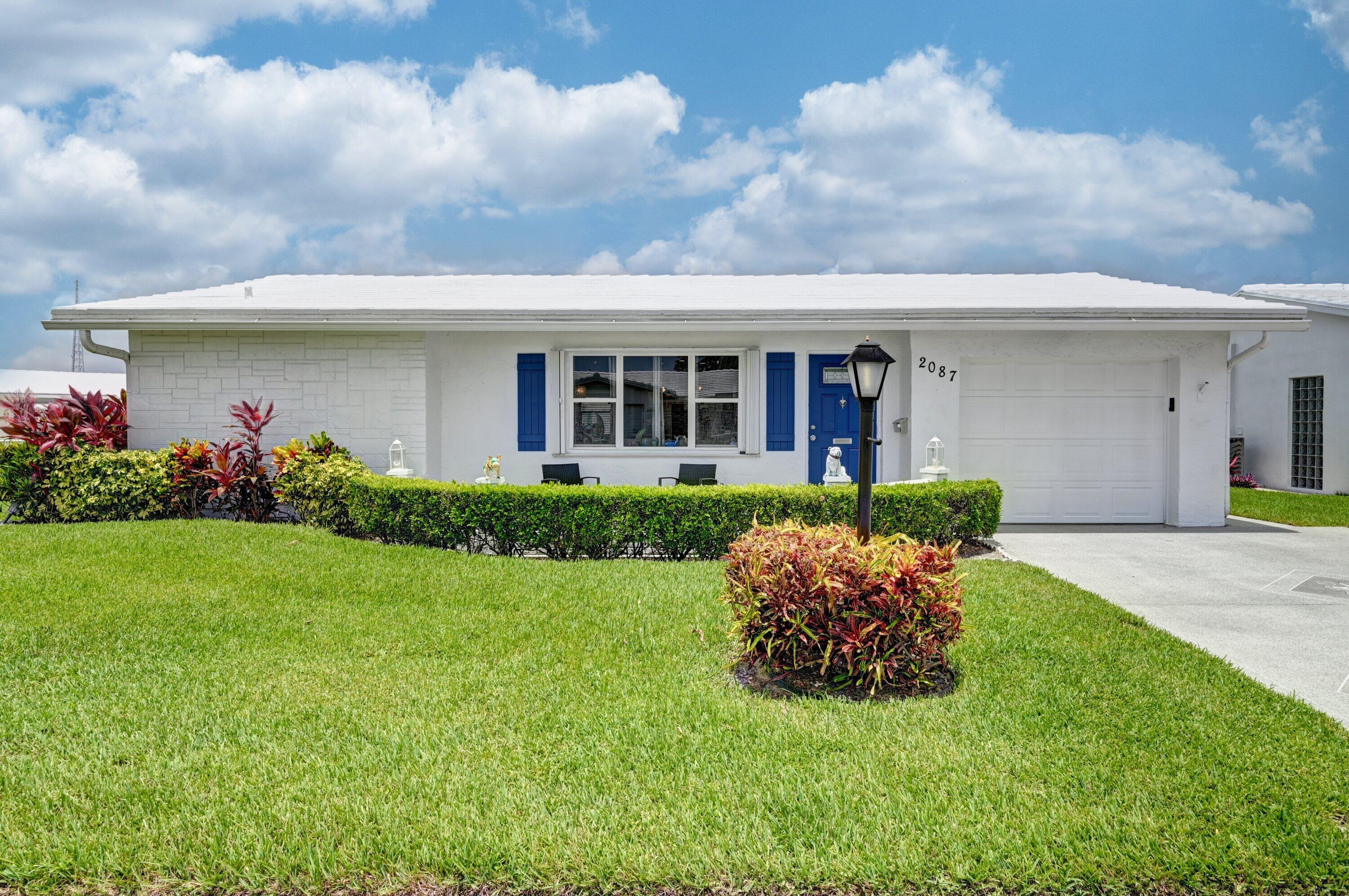 Property Photo: 2087 SW 12th Avenue FL 33426