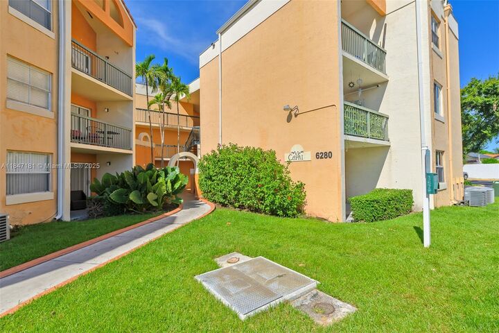 Property Photo:  6280 NW 186th St 212  FL 33015 