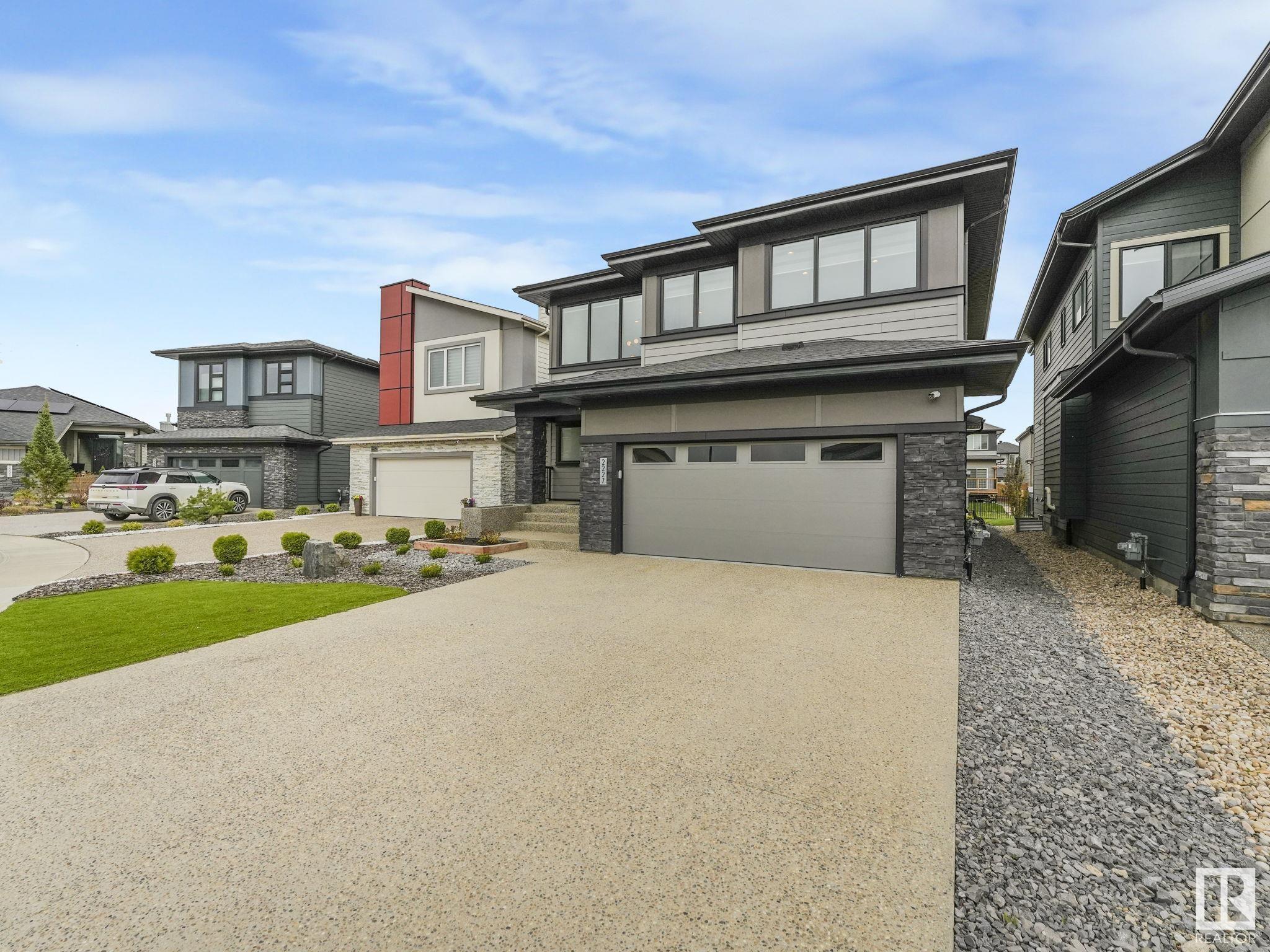 Property Photo: 2227 Kelly Crescent SW AB T6W 3R8